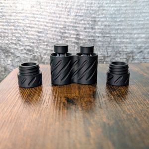 Caps off: each slot has its own cap, so one vial can come out while the other stays covered. Vials shown for fit - not included.