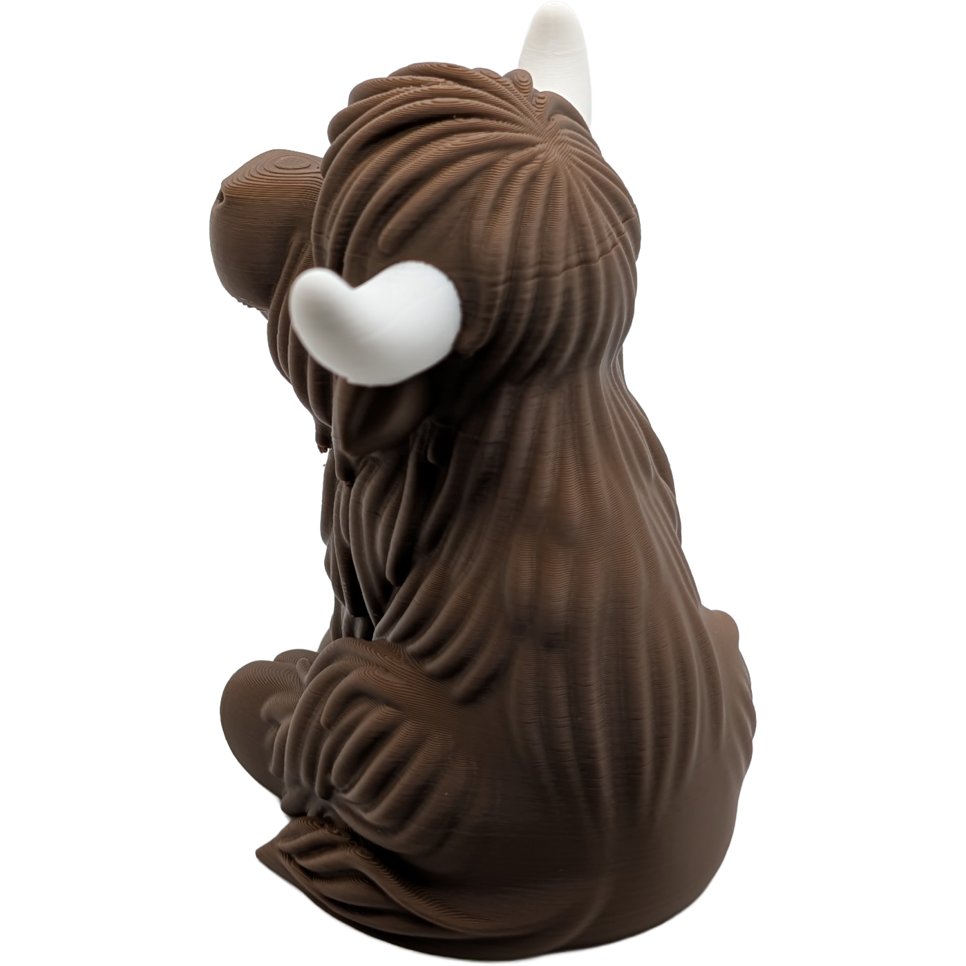 Sitting Highland Cow